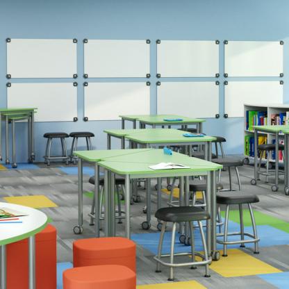 Many whiteboards mounted side-by-side to create a whiteboard wall.