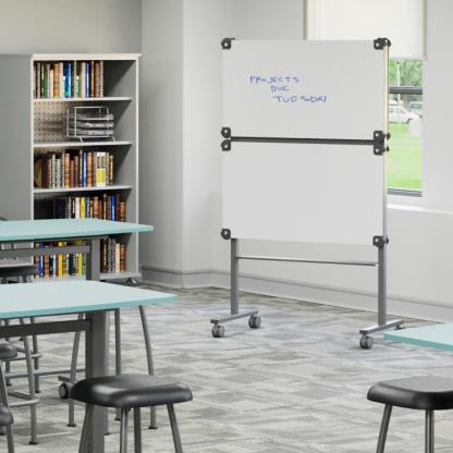'Projects due Tuesday' written on classroom whiteboard