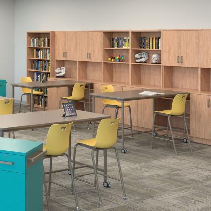 Open and closed storage cabinets with books.