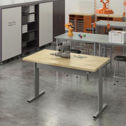 CTE classroom with adjustable height tables.