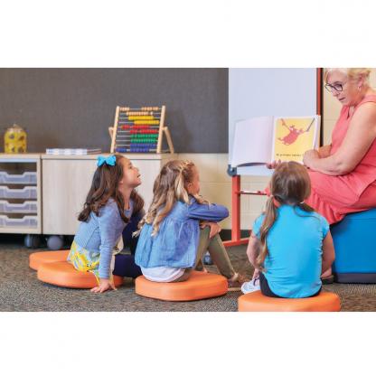 teacher reading to students