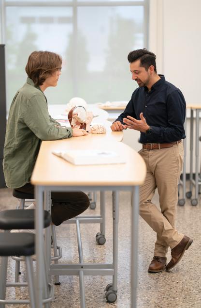 Teacher with student