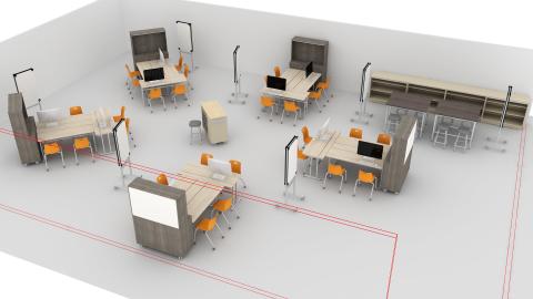 Computer lab with group seating around podium