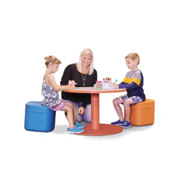 kids with teacher and desk