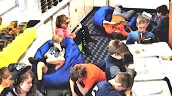 Students sitting in various positions