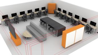 Gaming room with computers and desks against back walls